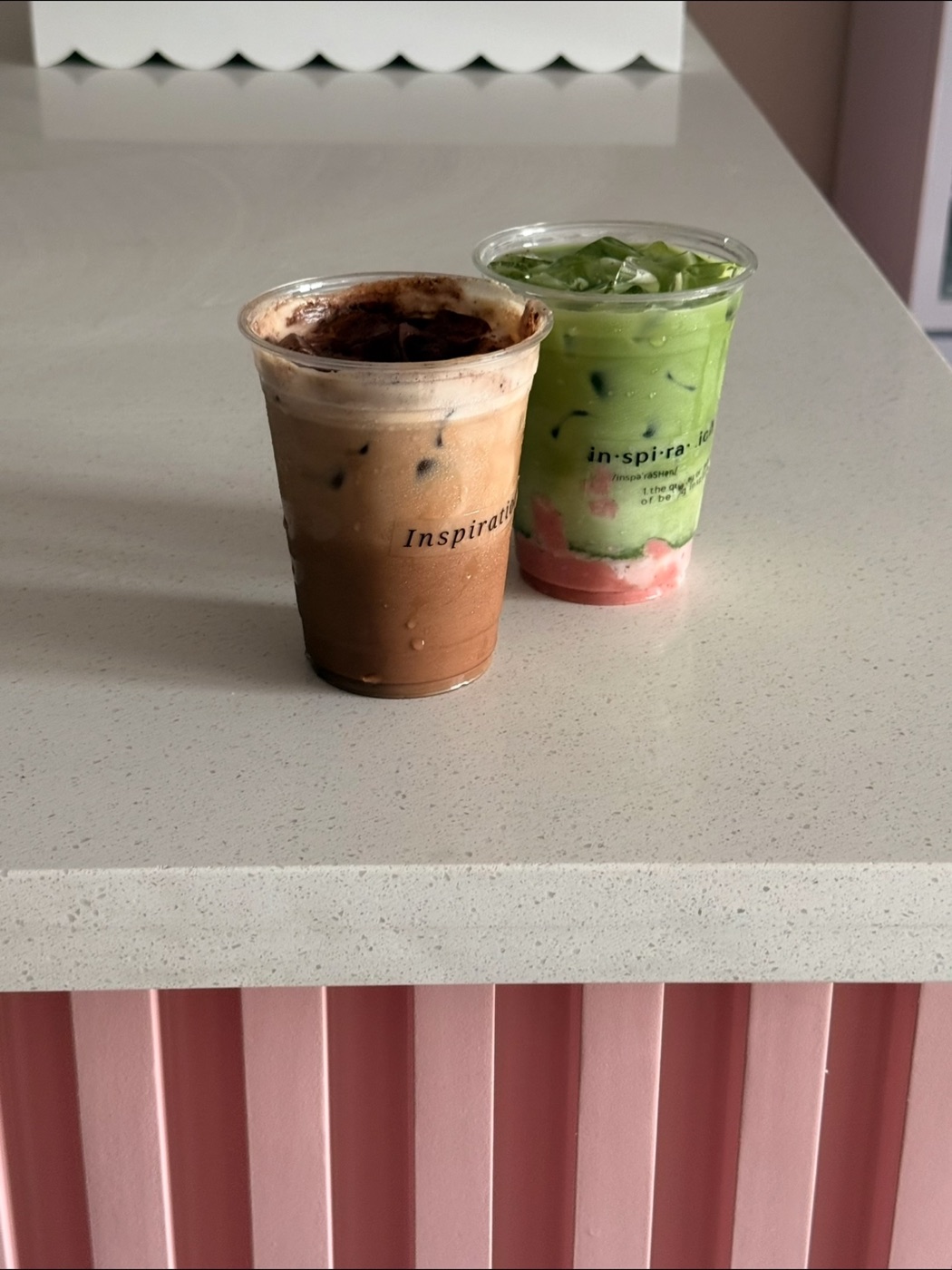 A dark chocolate latte and a strawberry matcha